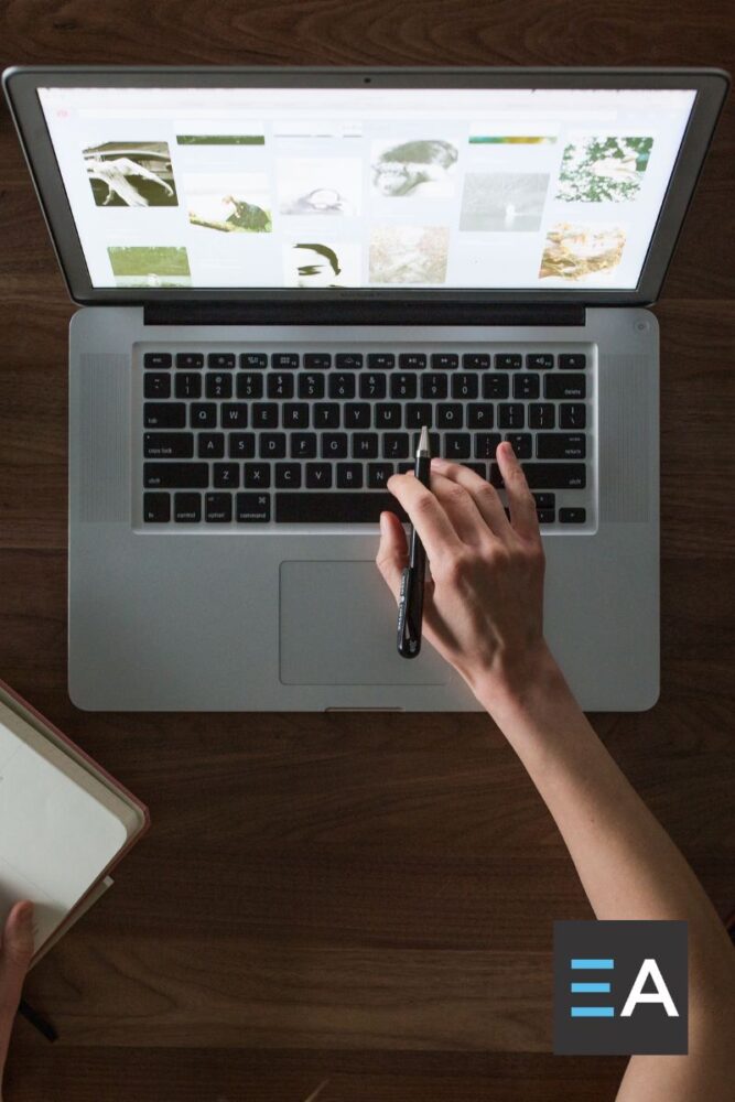 A person working on web design on a laptop