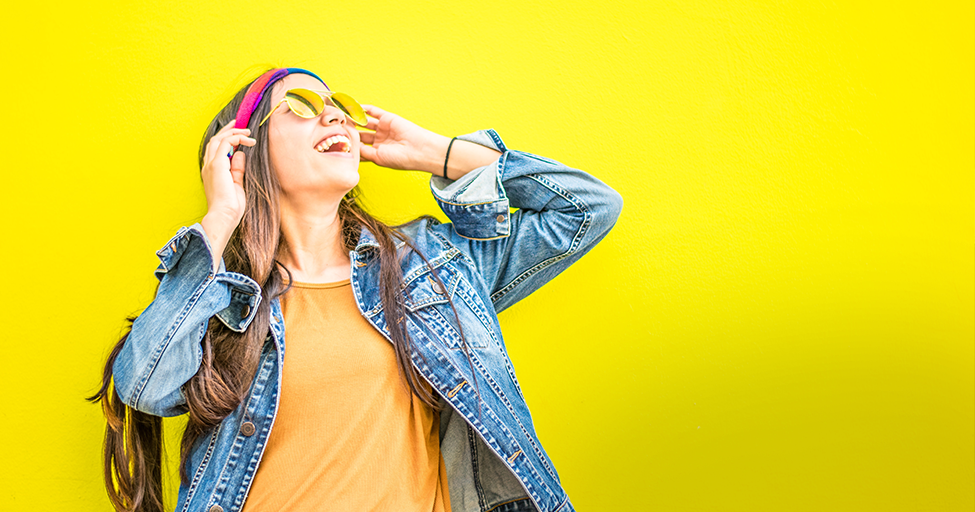 excited person with yellow background