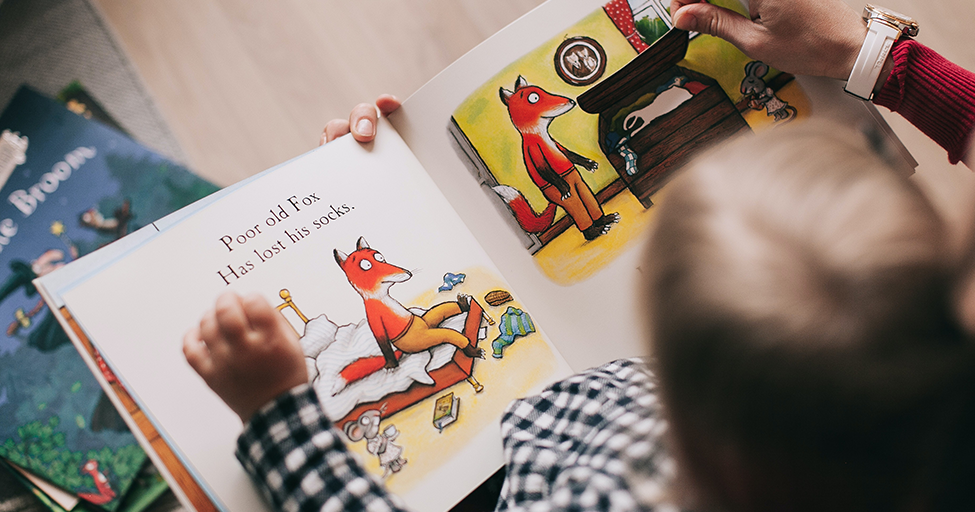 child reading a picture book