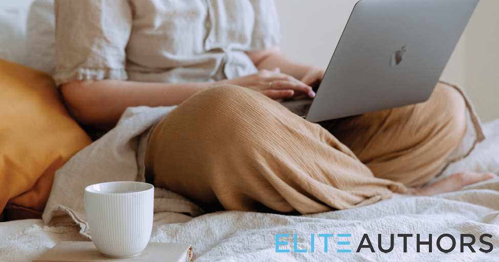 person sitting with laptop on lap